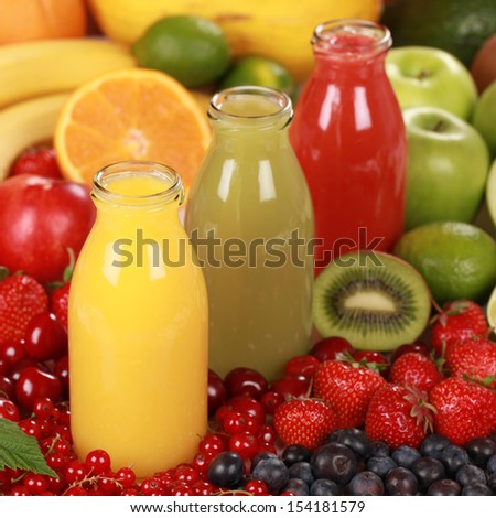 Fresh fruit smoothies made from oranges, strawberries and kiwi