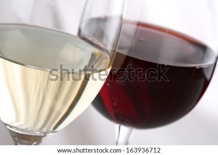 Red wine and white wine in wine glasses