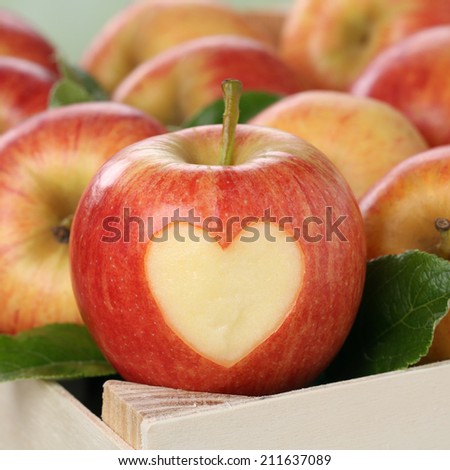 Apple fruit with heart in a box love topic