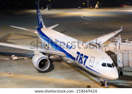 TOKYO - MAY 26: An ANA All Nippon Airways Boeing 787 Dreamliner on May 26, 2014 in Tokyo. The Boeing 787 Dreamliner is the world\'s first airliner to use composite materials in the construction.