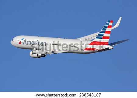 BARCELONA, SPAIN - DECEMBER 11: An American Airlines Boeing 767 taking off on December 11, 2014 in Barcelona. American Airlines is the world\'s largest airline with 108 million passengers.