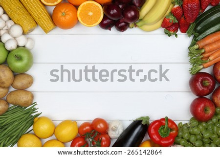 Healthy vegetarian and vegan eating frame from vegetables and fruits with copyspace