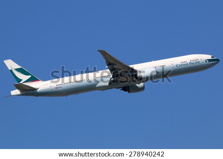 FRANKFURT - SEPTEMBER 17: A Cathay Pacific Boeing 777 airplane taking off on September 17, 2014 in Frankfurt. Cathay Pacific is the flag carrier and largest airline in Hong Kong.