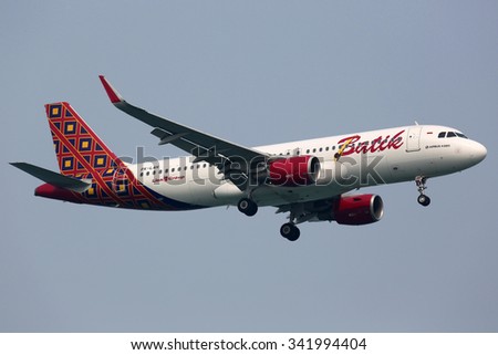 SINGAPORE - OCTOBER 21:  A Batik Air Airbus A320 on approach to Singapore Airport on October 21, 2015 in Singapore. Batik Air is an airline from Indonesia based at Jakarta airport.