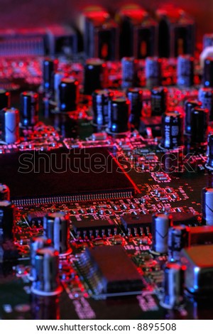Image shows the electronics of a computer sound board. The image has been slightly underexposed to simulate the interior of the computer