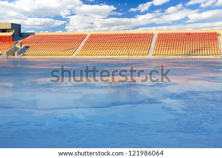 Winter work on filling the stadium with water. Skating