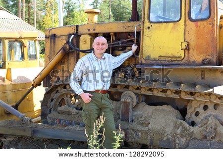 man standing  driver   excavator crane