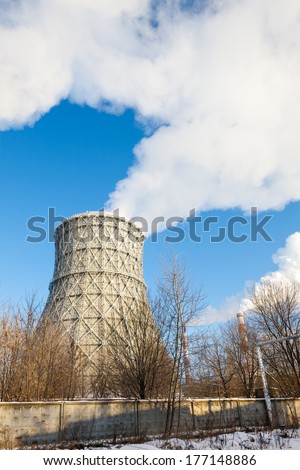smokestack tower thermal power station in winter