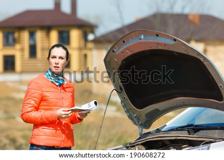 Concerned about the girl in the broken car with open hood User Guide