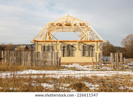 new house under construction in countryside