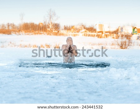 winter recreation - swimming in the ice-hole