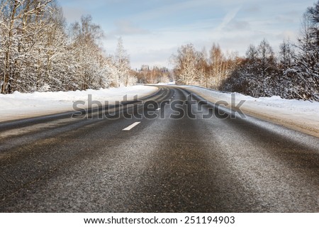 Danger and fast turn at the icy snow road