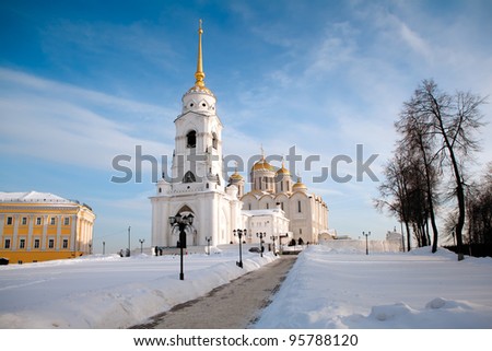 Golden domes of the Russian Orthodox church against the blue sky background