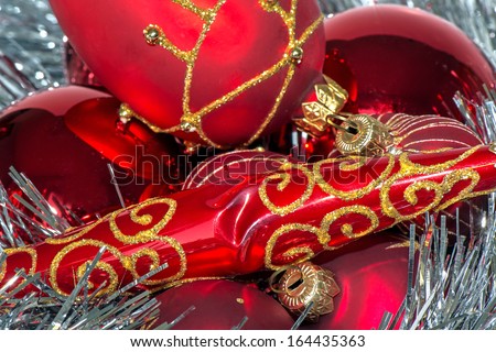 Christmas decoration red balls on glossy background