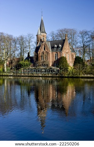 Medieval building on Love lake, Bruges, Belgium