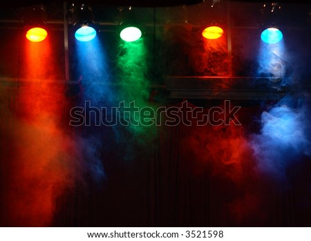 five theater lights with smoke