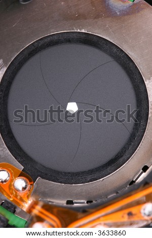 macro aperture of lense with small hole with electronics part