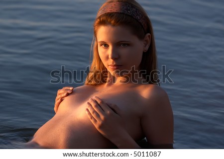 stock photo beautiful nude girl in water