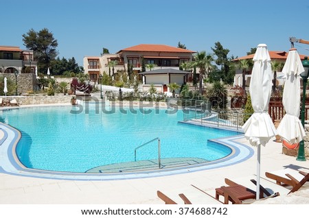 Kassandra, HALKIDIKI, GREECE - MAY 05, 2012: Blue pool in luxury Greek hotel Aegean Melathron Thalasso, Halkidiki, Greece.