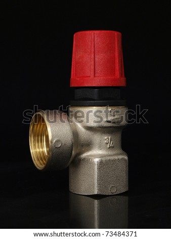 over pressure release valve on black ground
