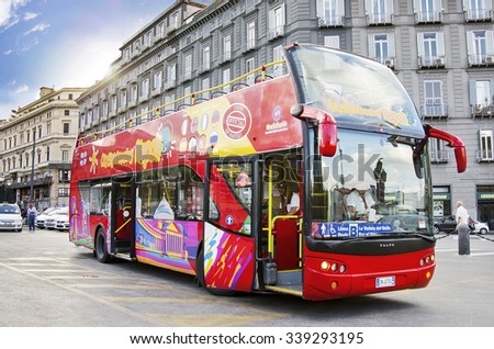 NAPLES, ITALY - SEPTEMBER 2-2014: a Citysightseeing bus on a bus stop in Naples Italy. Tourist bus is a popular transport for tourists in Naples.