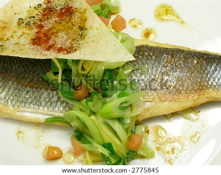 Fillet of sea bass with sring onions, olive oil and soy sauce
