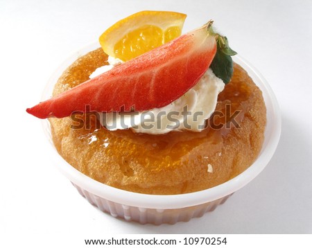 An individual cake with a strawberry