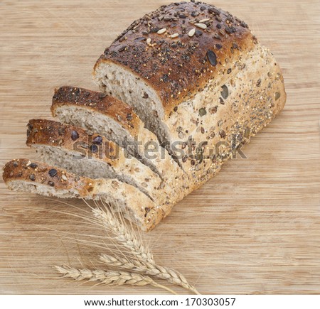 Bread with seeds and ears of wheat