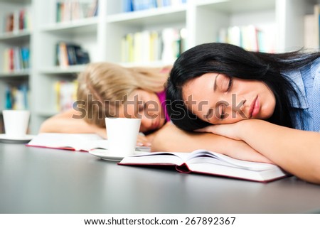 Tired students fell asleep in library
