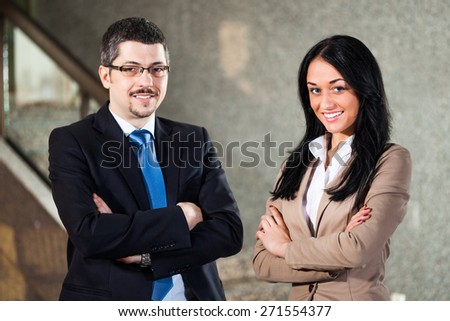 Two happy business persons