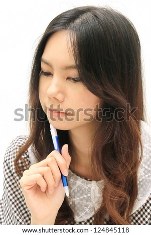 women thinking with pen