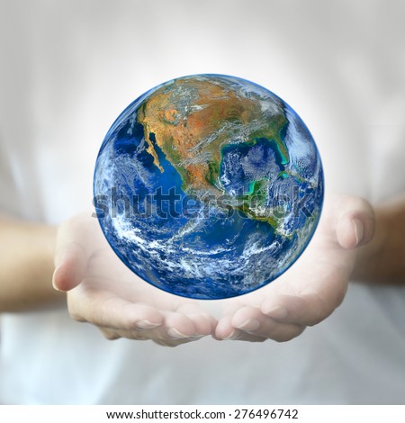 hand hold earth.,   Planet world. Elements of this image furnished by NASA