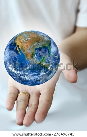 hand hold earth.,   Planet world. Elements of this image furnished by NASA