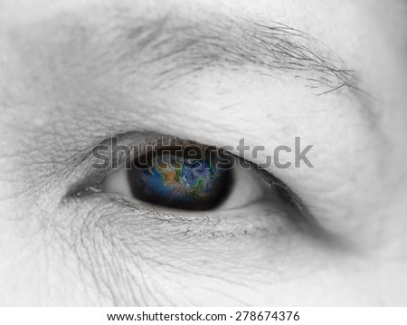 The earth in elderly women eye ,including elements furnished by NASA