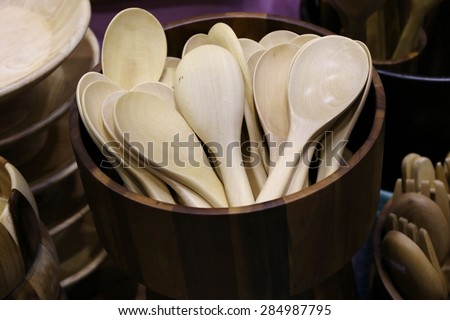 wood spoon in wood bowl