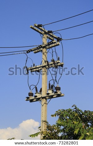 A silhouette of low voltage power lines against