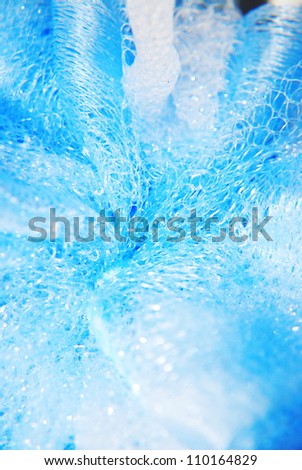 massage blue bath sponge with water drops