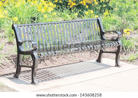 Empty black metal bench