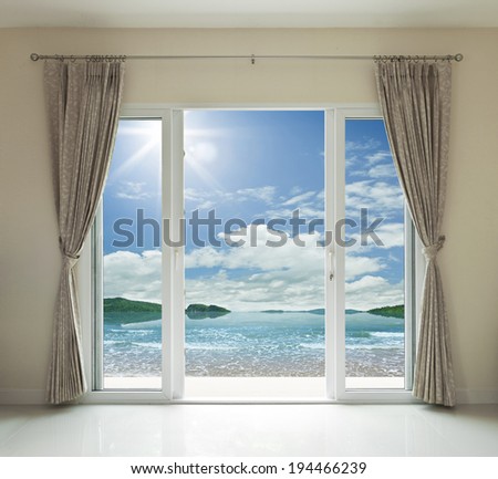 Opened door, sea view background
