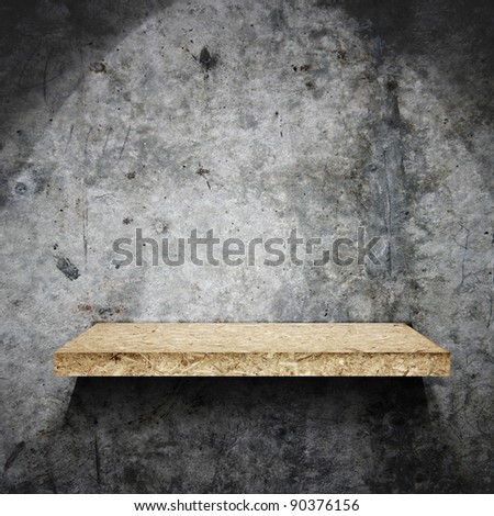 grunge  wall and wooden shelf
