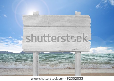 blank  wooden  sign on beach