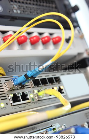 close up network switch and patch cables