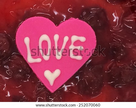 Love, word on  heart shape  put on  dessert  texture