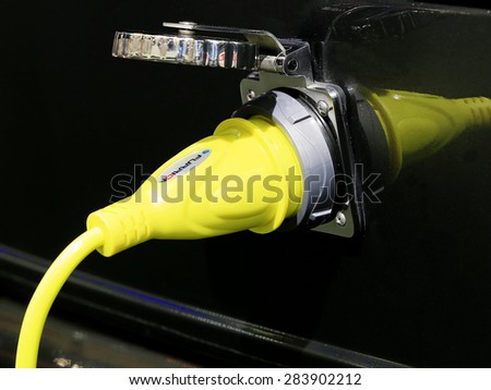 Bangkok - April 2 : yellow electric car charger of luxury Mercedes Benz mobile home car : in display at The 36th Bangkok international Motor Show 2015 on April 2, 2015 in Bangkok Thailand