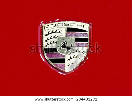 Bangkok - April 2 : - logo of Porsche on red texture  in display at The 36th Bangkok international Motor Show 2015 on April 2, 2015 in Bangkok Thailand
