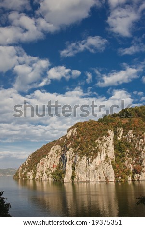 Danube Gorges reflecting in the Danube river, Romania.