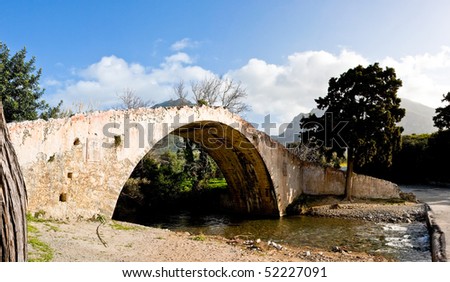 Old arched Venetian Bridge at Preveli in Crete, Greece