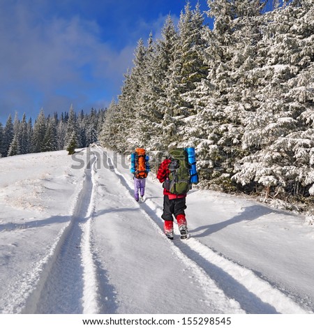 Tourists on winter walk