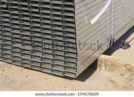 Pile of tin building profile