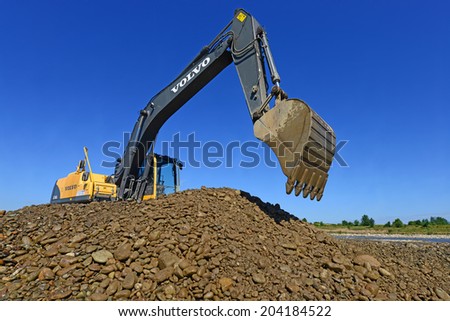 Kalush, Ukraine - July 22: Gravel excavated in the mainstream of the river near the town Kalush, Western Ukraine July 22, 2013